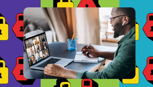 a person participates in a videoconference, with multiple people on a laptop screen